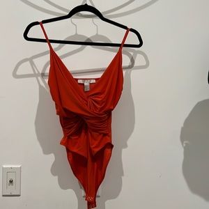 Orange red knotted front body suit